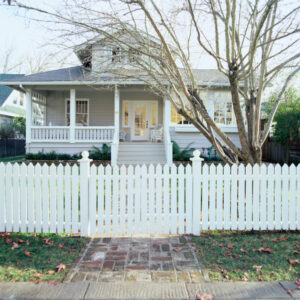 Picket Fence in Front of a House